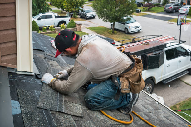 Professional Roofing technician working in Rome City, IN